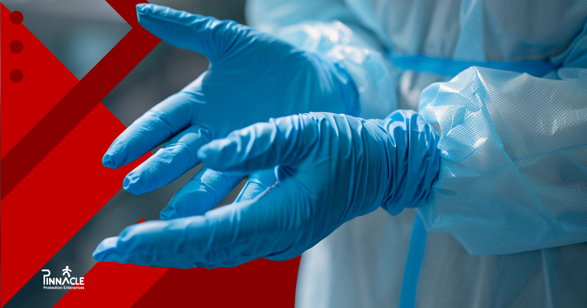 Healthcare worker wearing blue nitrile disposable gloves and protective clothing, with the guide title Choosing the Right Disposable Glove